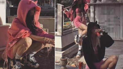 Antalya'da yabancı uyruklu iki genç kız, bir mezar taşının üzerine