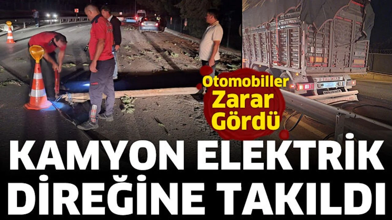 Kamyon direğe takıldı, devrilen direk araçlara zarar verdi