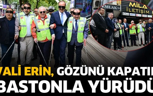 Vali Erin, gözünü kapatıp bastonla yürüdü