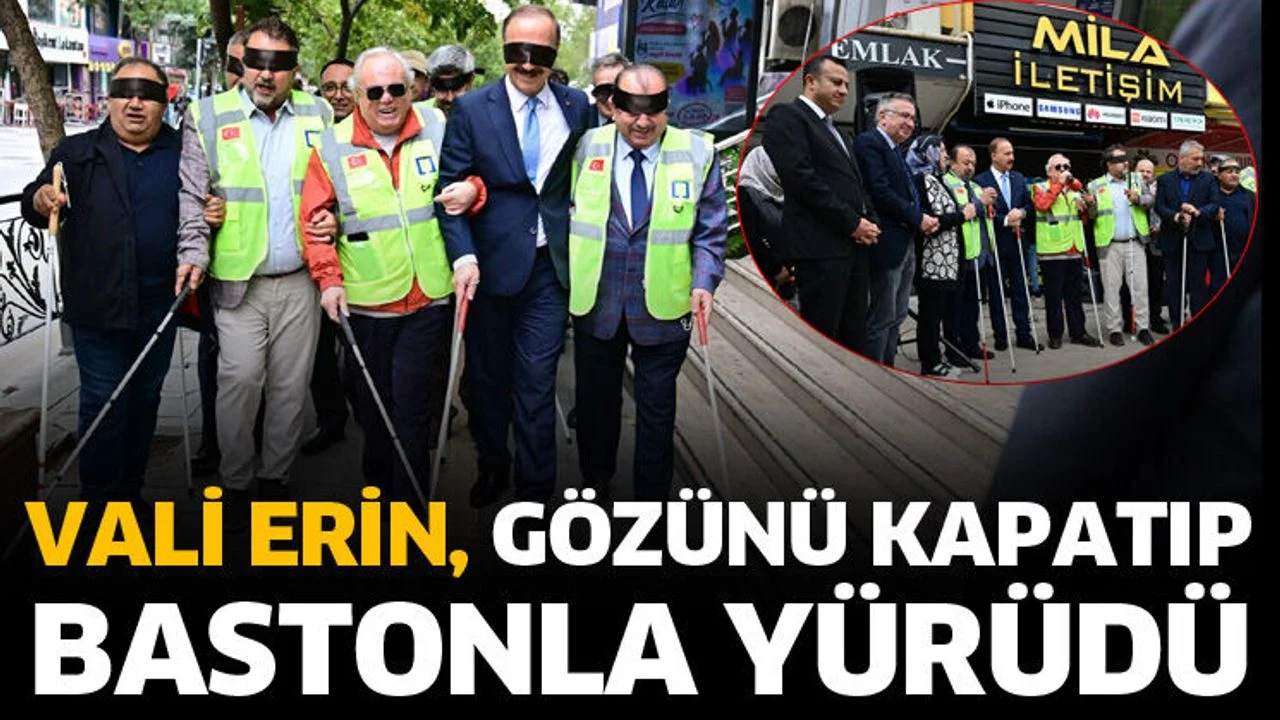 Vali Erin, gözünü kapatıp bastonla yürüdü